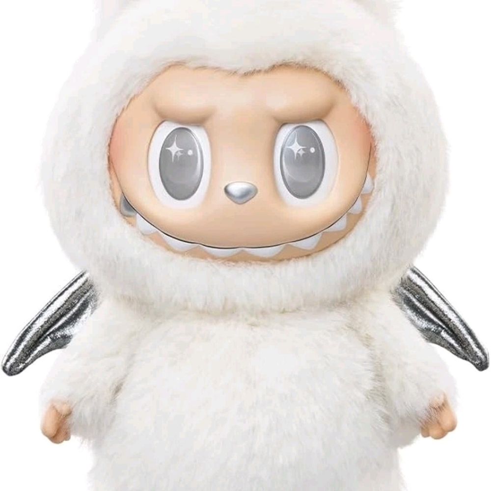 White and Silver Plush Doll